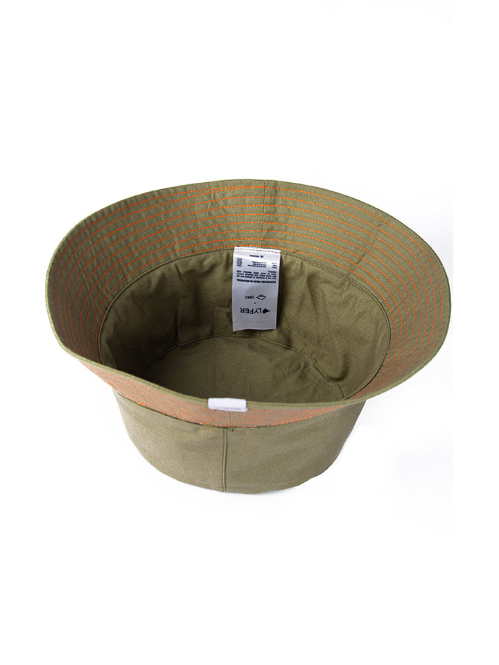Upside down, and inside shot of Lyfer 's fashionable bucket tat with Lyfer Embroidery and original orange stitching, showing the position of the Its All About The Birds woven tag. Upcycled birdwatching hat – gift for outdoor birders
