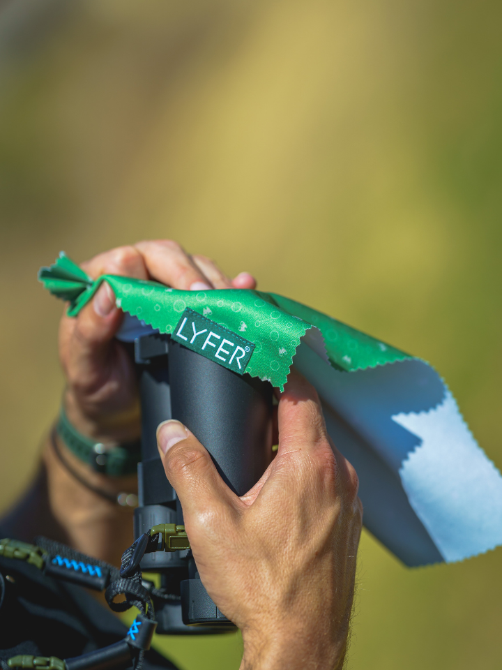 Close up design-led camera micro-fibre cloth and the binocular straps for birders, an ideal birdwatching gift for Australian birders.