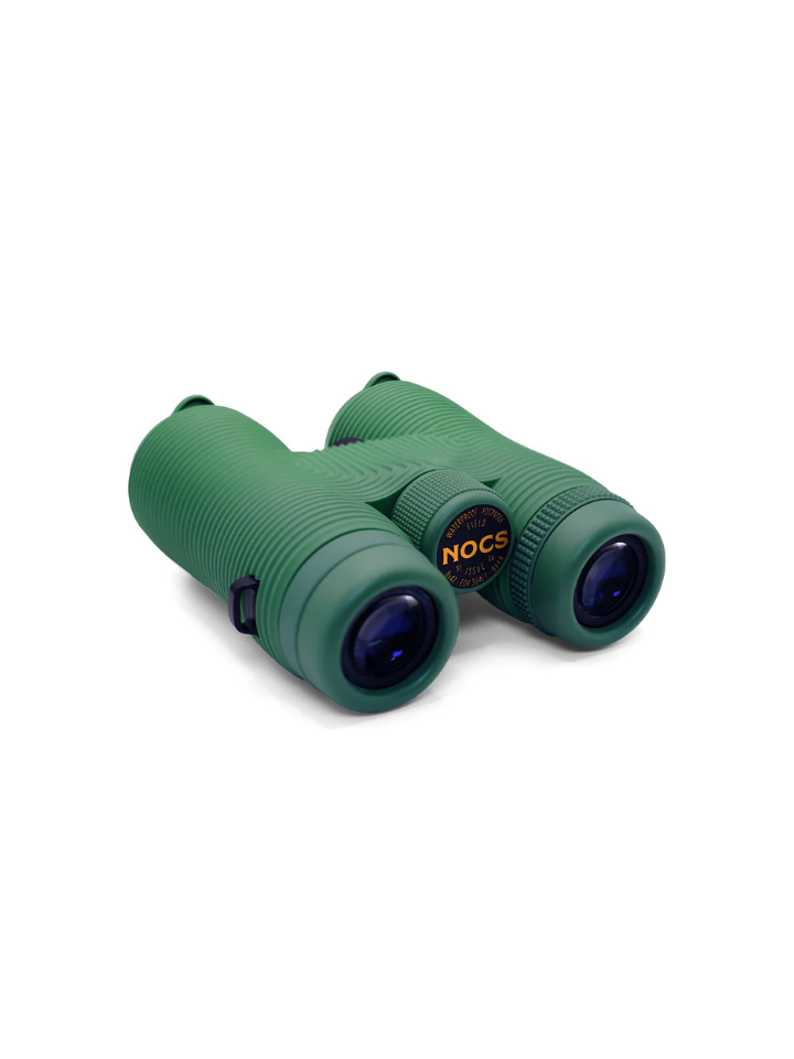 NOCS 8x42 birding binoculars on a white background with caps down showing the optics