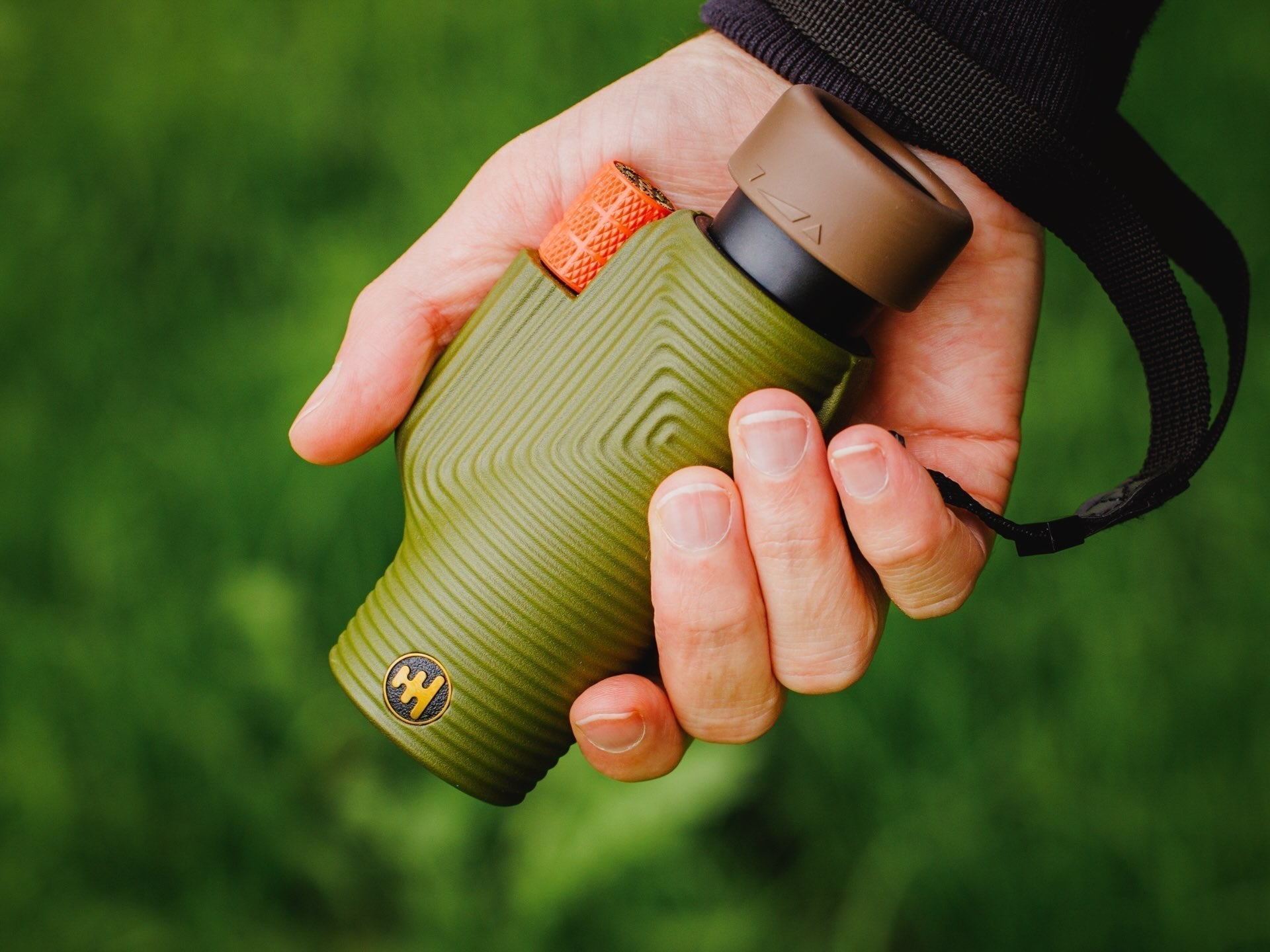 Monoculars and binoculars for birding shown outdoors