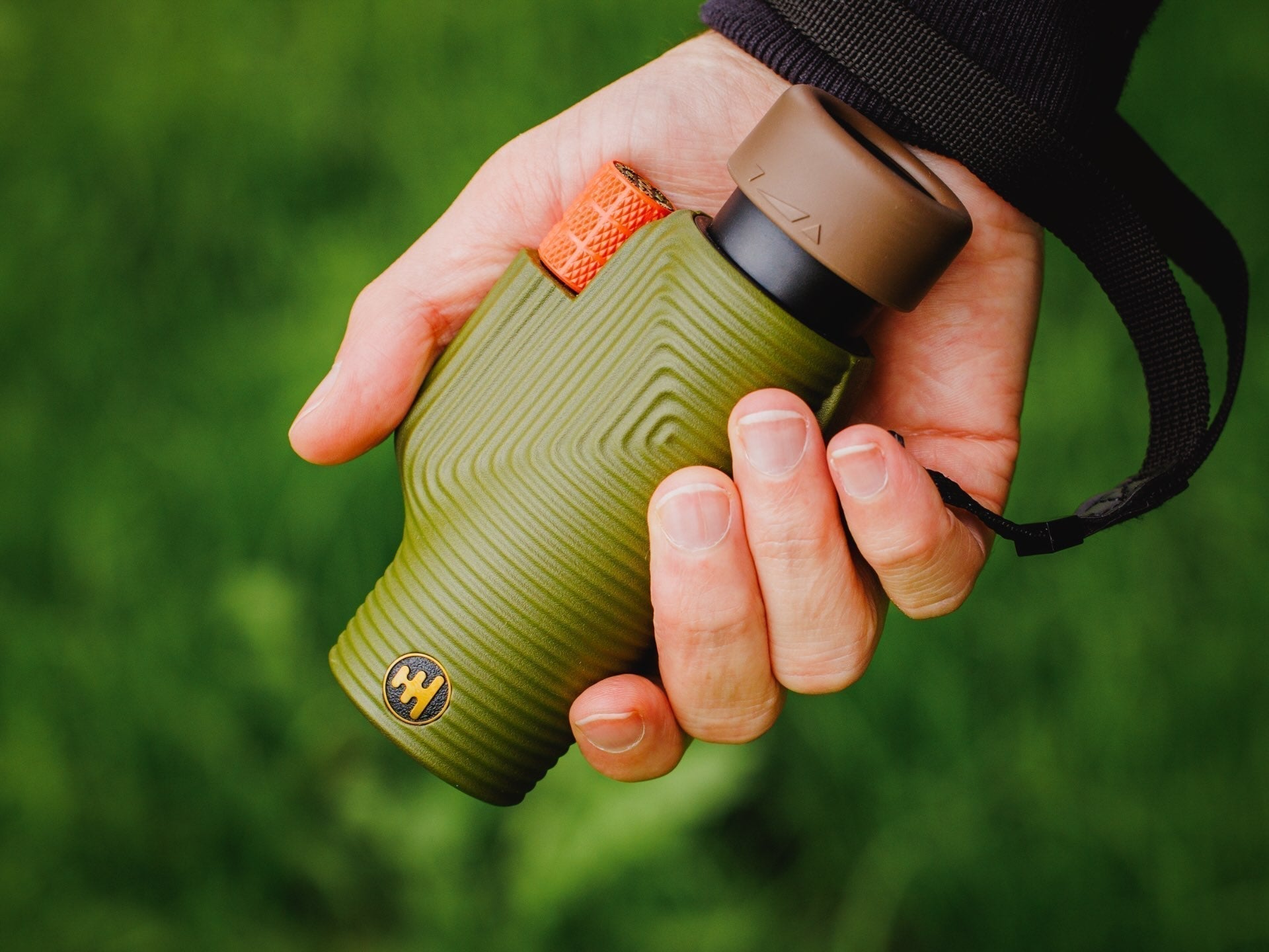 Monoculars and binoculars for birding shown outdoors