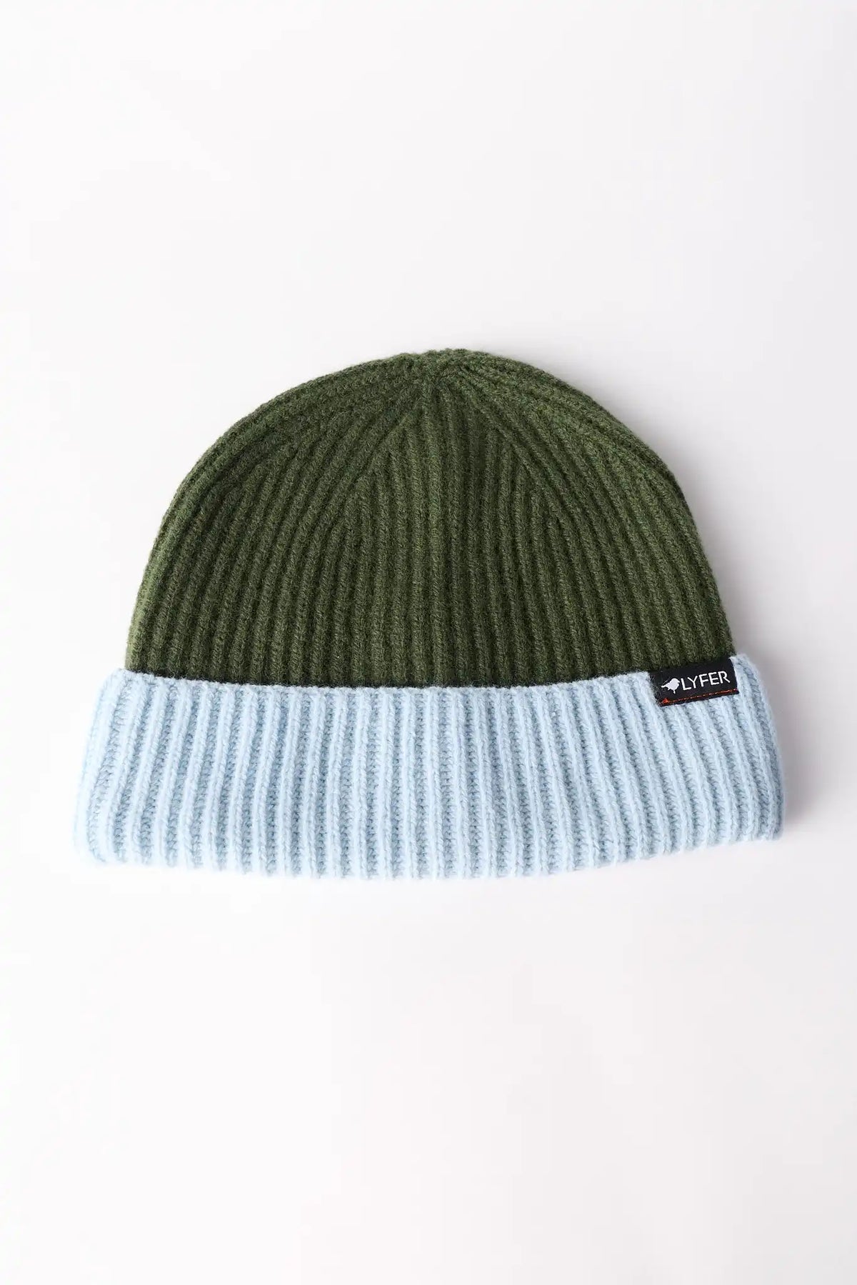 A ribbed knit beanie hat with an olive green top section and a light blue folded cuff, featuring a small black brand LYFER tag on the side.