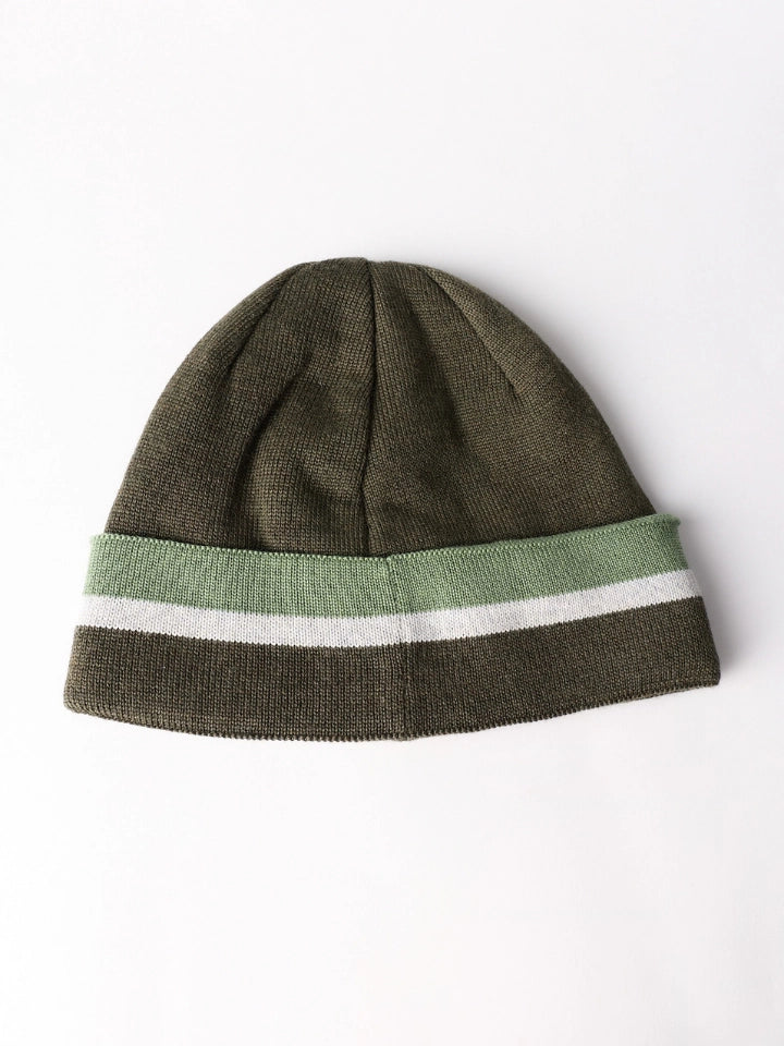 Product shot of a merino wool hat in green stripes