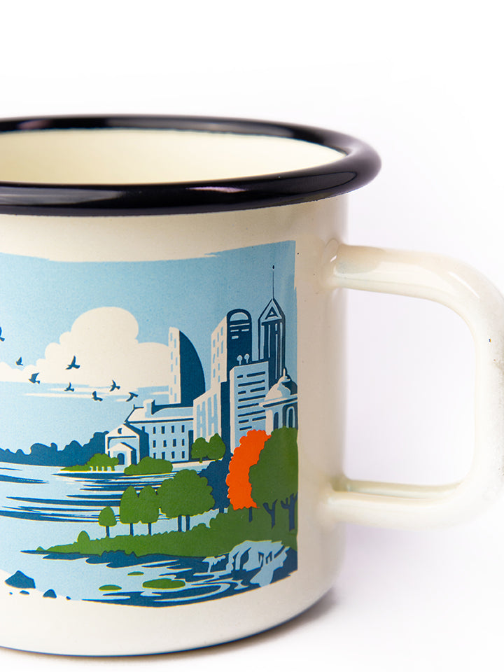 Side close-up of Lyfer's birding enamel mug.  Detailed view of the mug’s premium craftsmanship and smooth enamel surface.