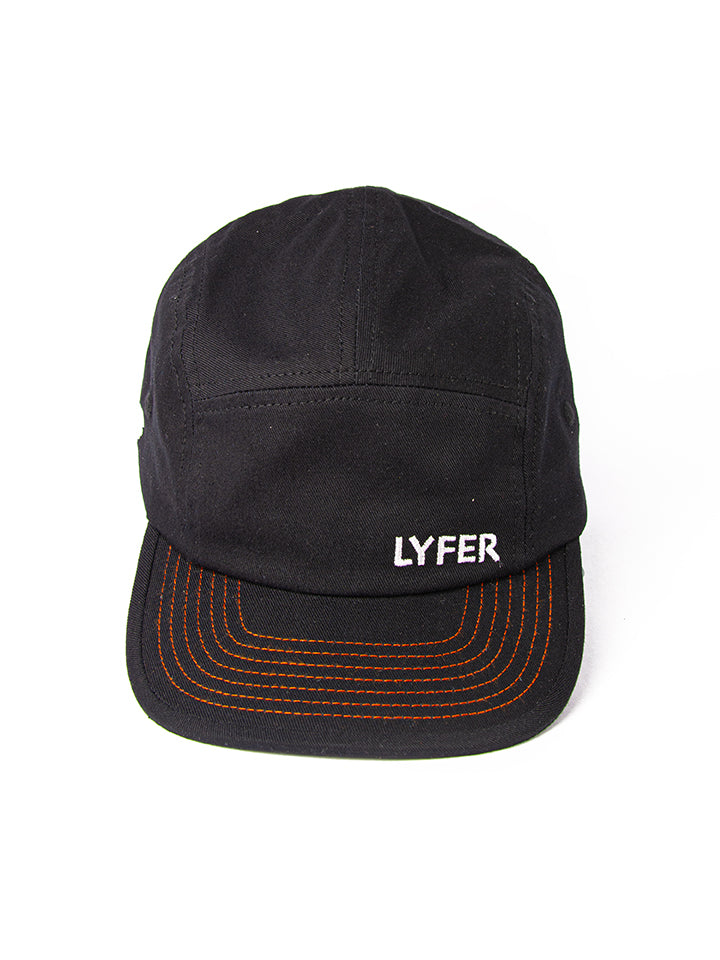 Front view of the Lyfer brand name on the  5-panel cap also showing the unique lyfer orange stitching detailing on rim.