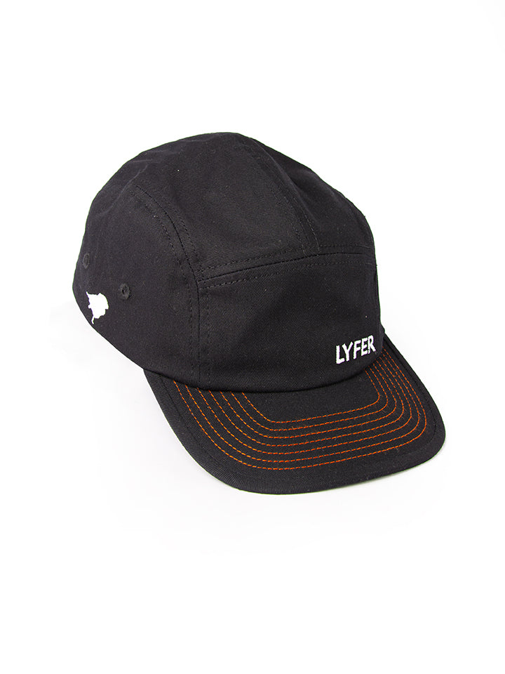 Side view of the Lyfer brand 5-panel cap showing the sleek, designer birdmark on the side and its proportions and the orange threading detail.