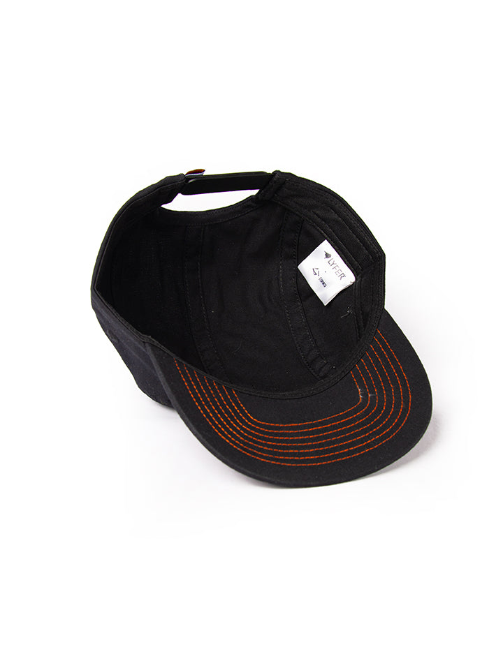 Inside of the Lyfer brand 5-panel cap showing its detailed construction, orange thread detail and the collaboration tag with Topiku. 