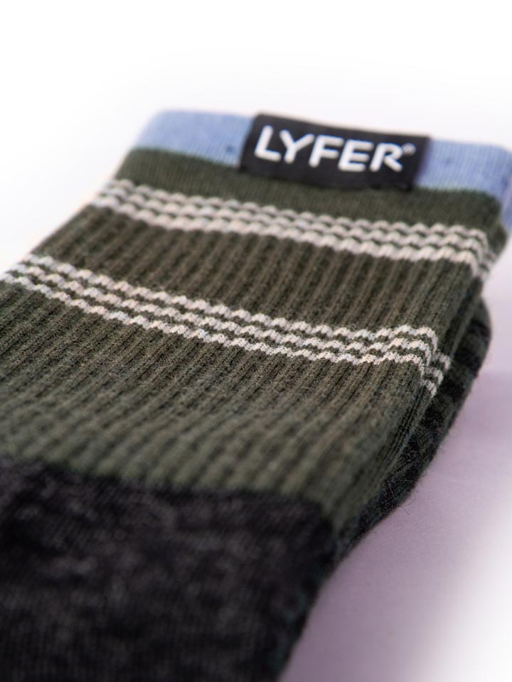 Close-up of Lyfer Original Birdmark socks, highlighting the intricate detailing and fabric texture