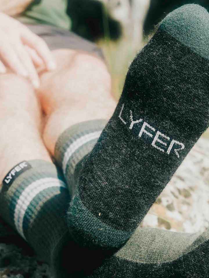 Lyfer Original brand logo on base of socks with close up, showing their stylish look and comfort in action and the overall design.