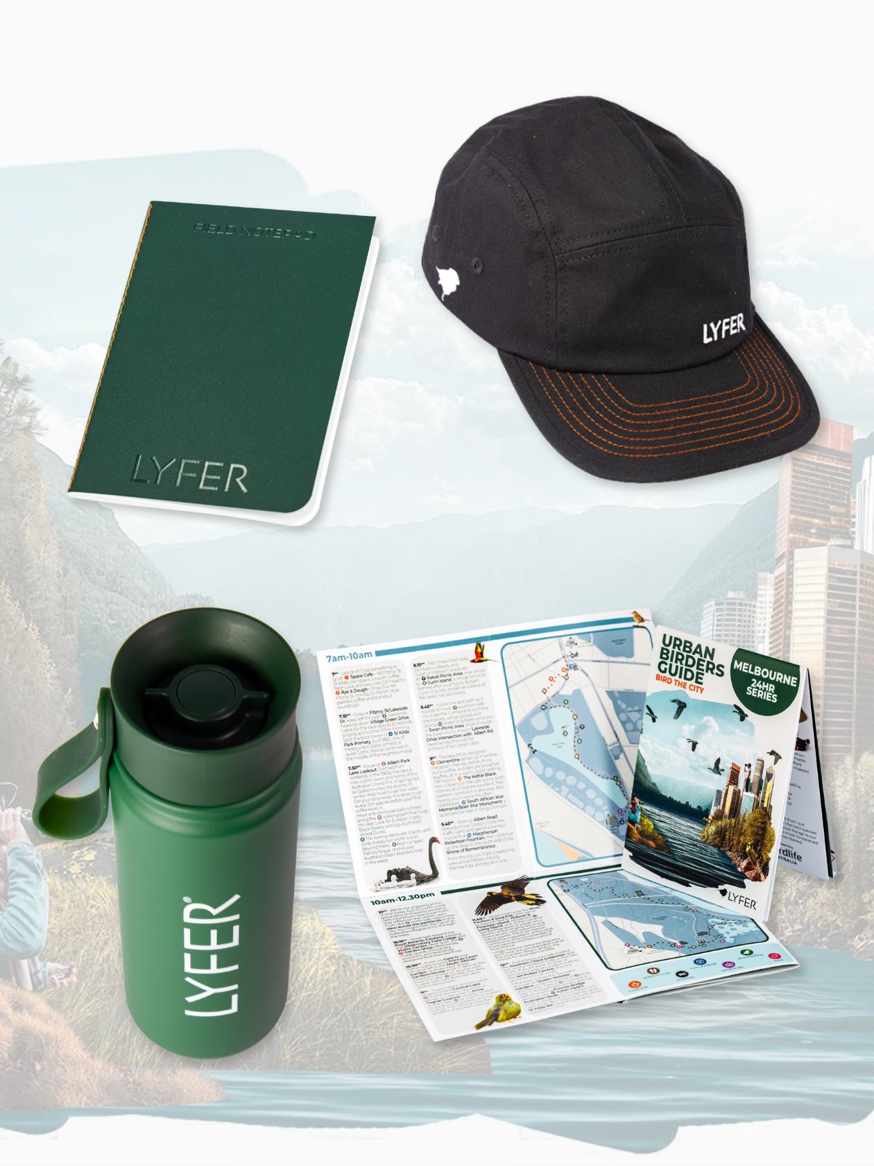 LYFER branded items including a cap, mug, notebook, and maps on a textured surface.