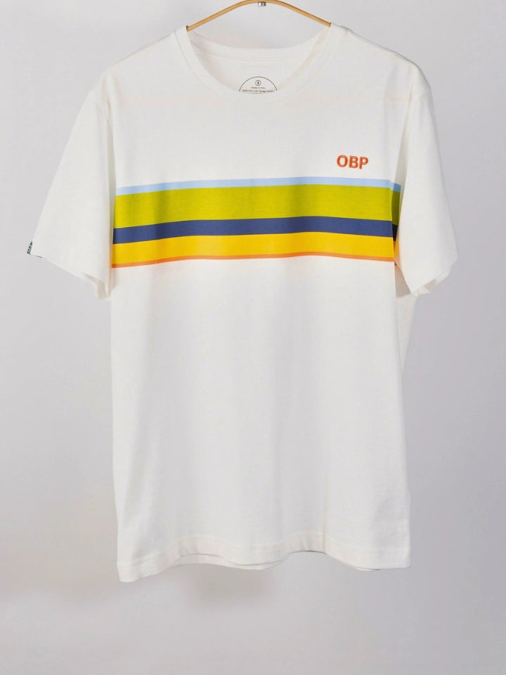A white short-sleeve crewneck t-shirt hanging on a wooden hanger against a light gray wall. The shirt features a horizontal stripe pattern across the chest with yellow, navy blue, and light blue stripes, and the letters 'OBP' printed in orange on the left chest.