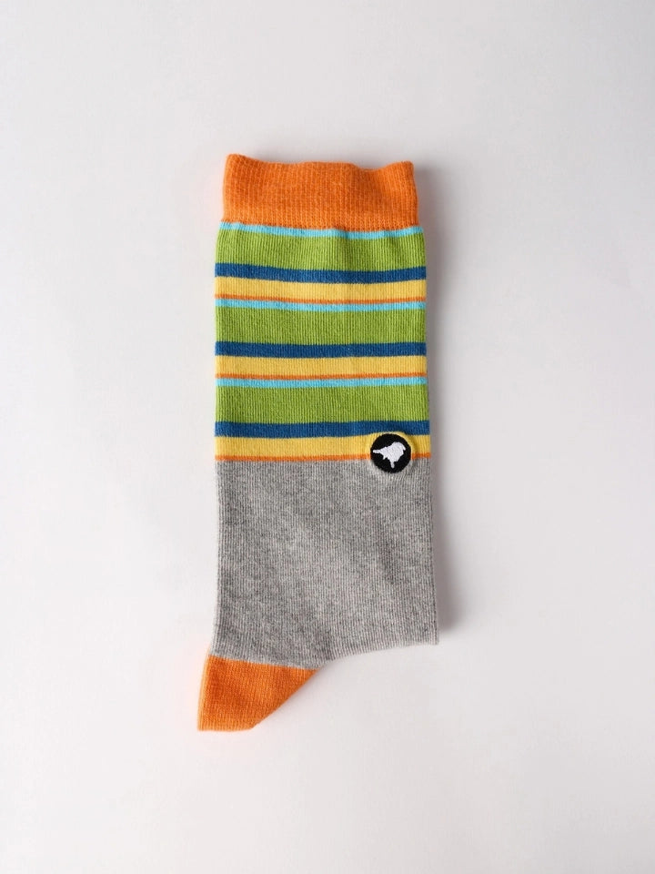 Multi-coloured socks by LYFER showing the detailed embroidery and design structure