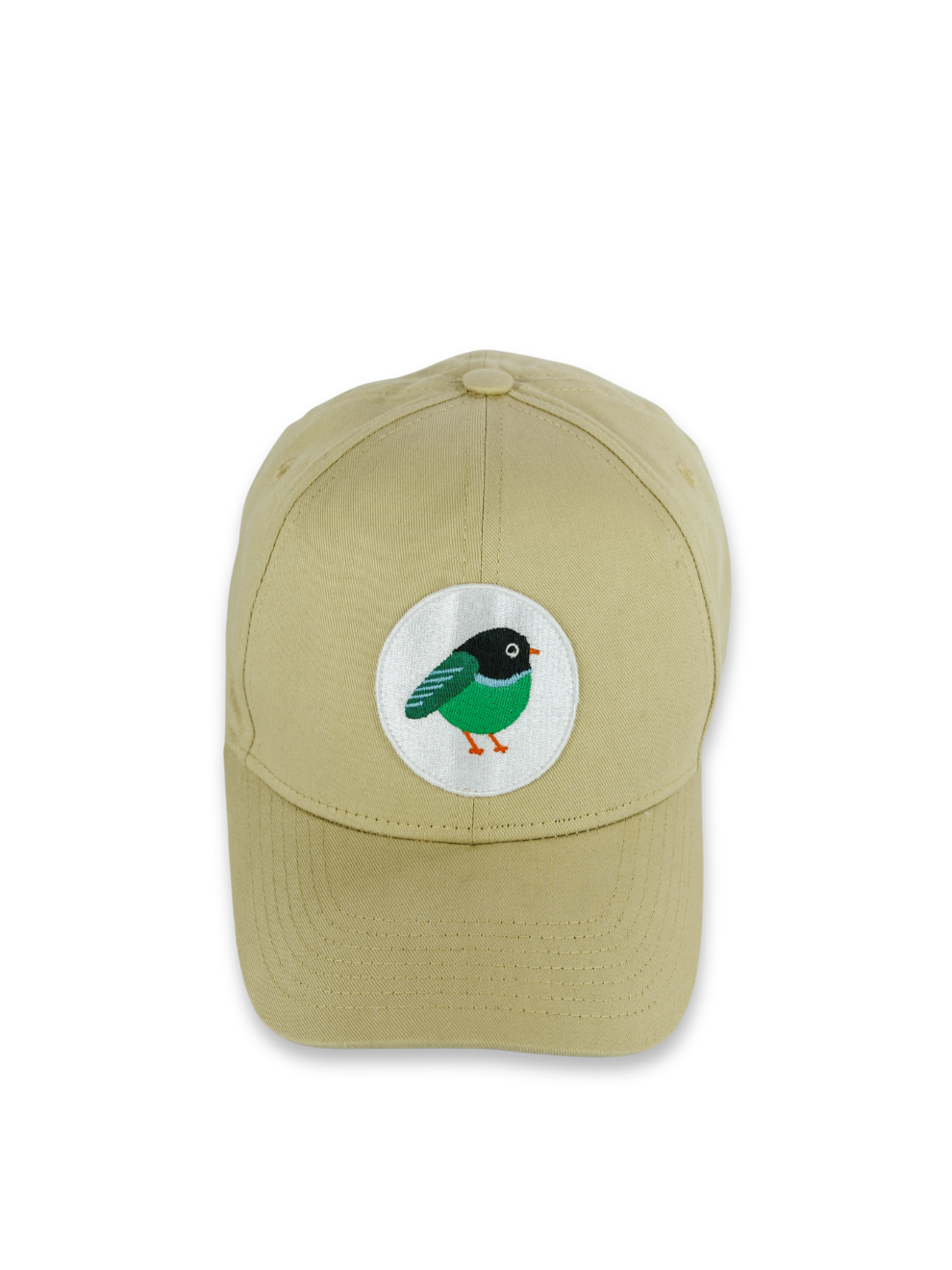 Sand coloured baseball cap with patch of bird studio shot